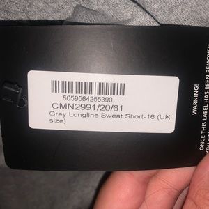 grey longline sweat shorts